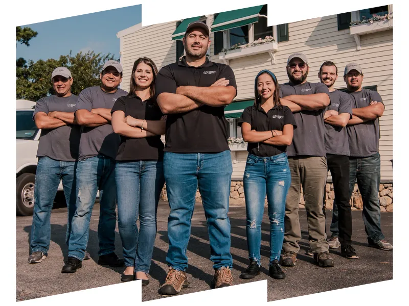 Granite World Team with their arms crossed. They are standing in a arrow formation.