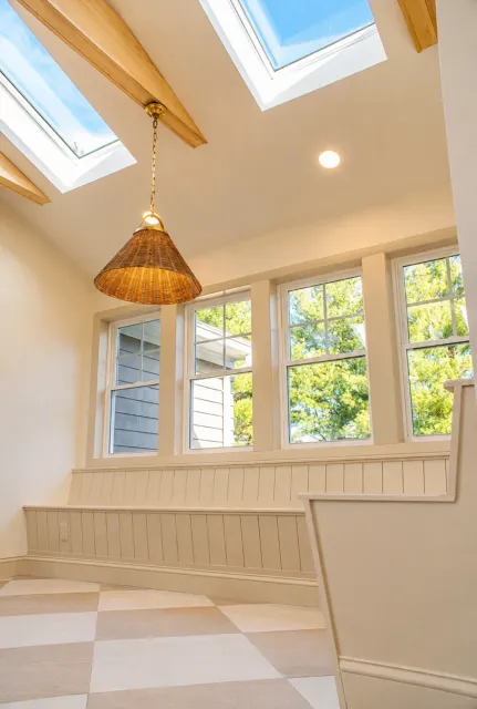 Exposed wood beams and skylights in the Barrington kitchen addition