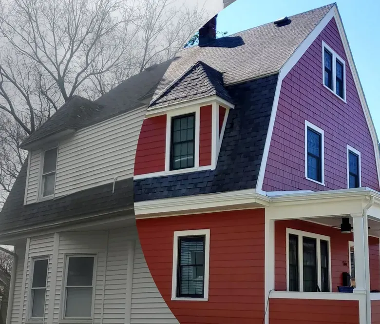 Colorful two-story house with red, gray, and pink siding, dark roof, and leafless trees behind it