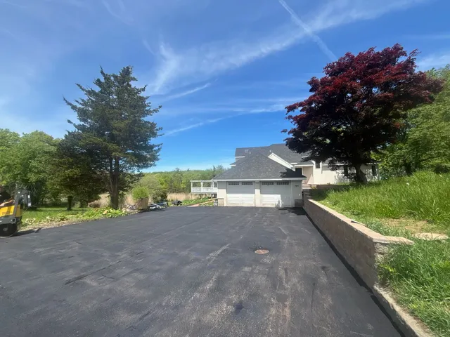 Her asphalt work photo
