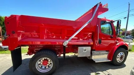 New red dump and work truck for Coelho and Sons Stonewall
