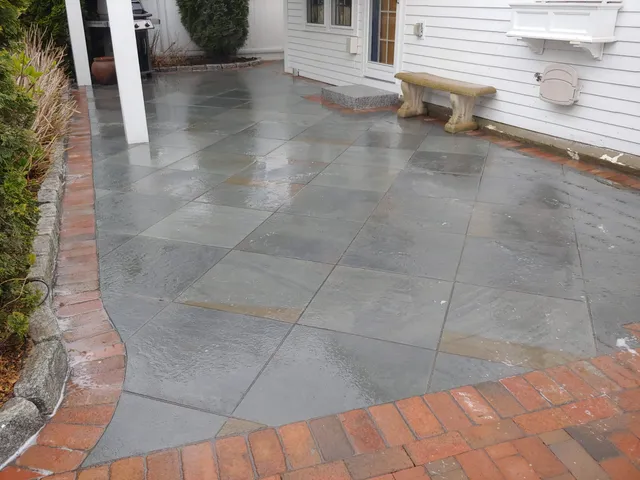 Custom stone patio built by Stiles and Sons in NH Seacoast