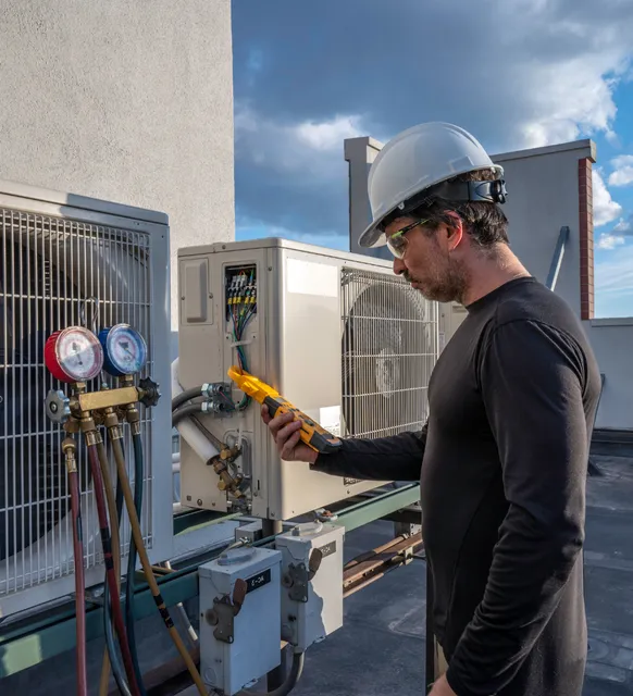 technician performing AC repair – Fairfield CT cooling company
