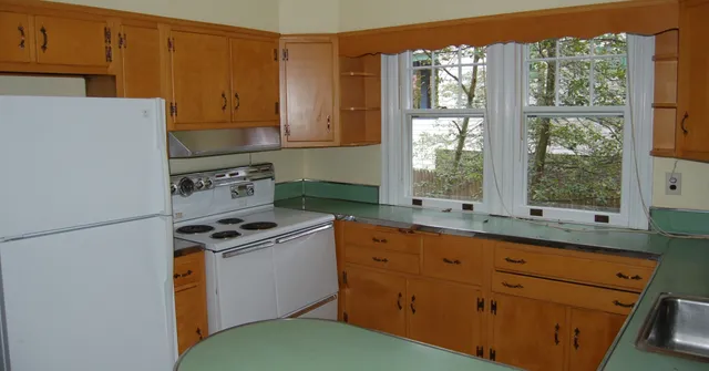 Same kitchen, same window. This one went from 1950s maple cabinets and mint green laminate to inset cabinetry, a soapstone island and a range that means business. 

cabinjohnbuilders.com

#beforeandafter #kitchenrenovation #customhomes #renovation #homebuilder #marylandhomes #dmv