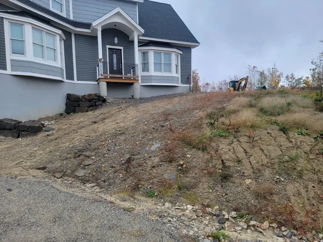 Hillside Property before Tyler Lawn Care work