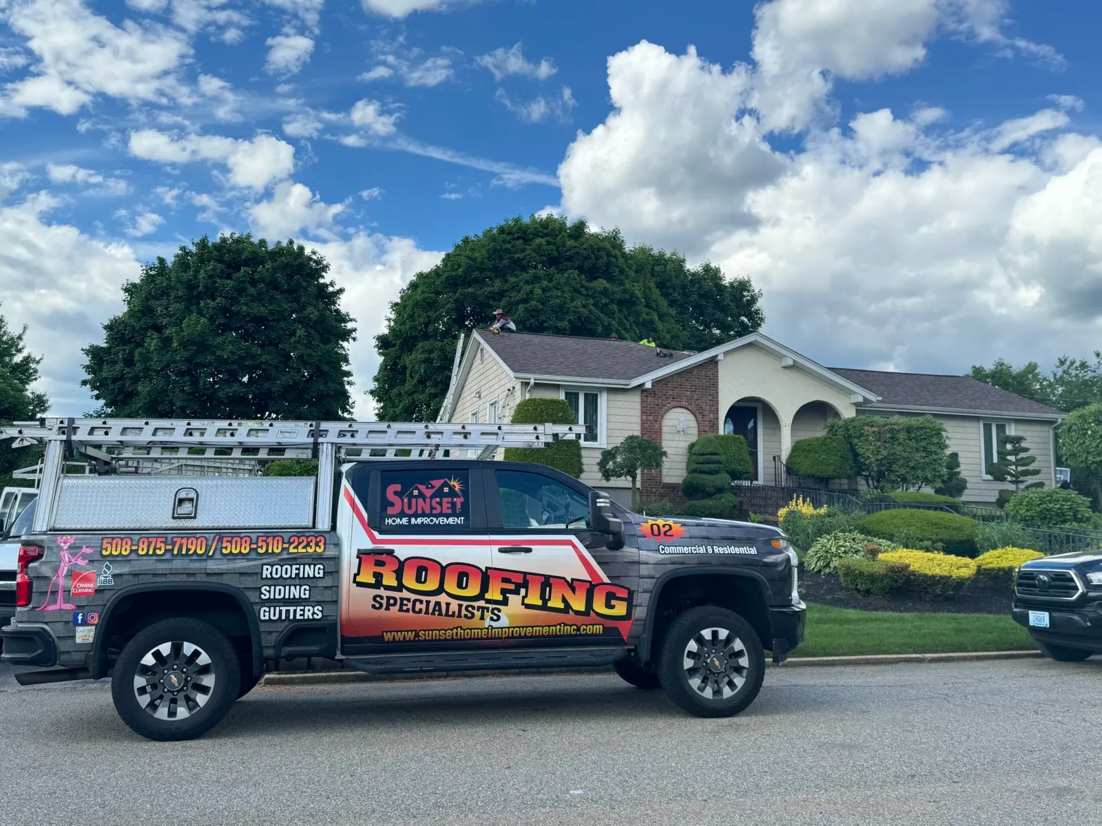 Sunset Home Improvement Inc roofing services truck