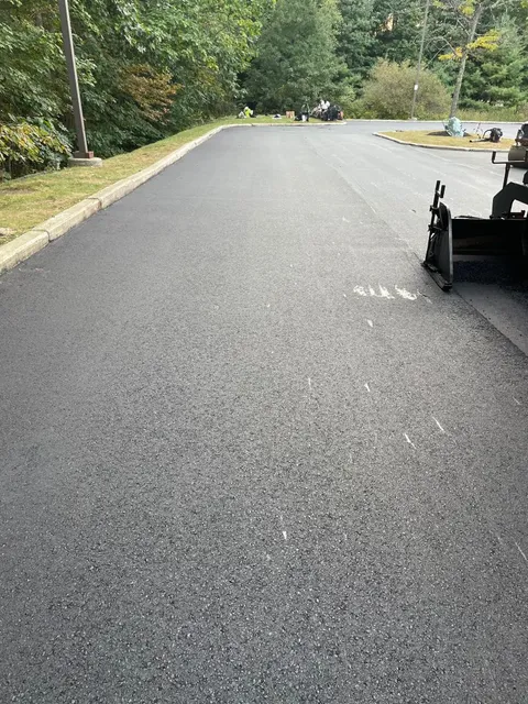 Sealcoated asphalt and curb in Scarborough Maine
