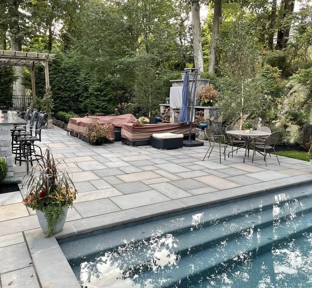 Bluestone patio with raised spa and fireplace