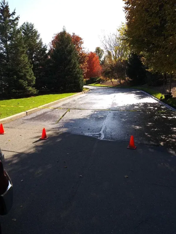 sealcoting a driveway