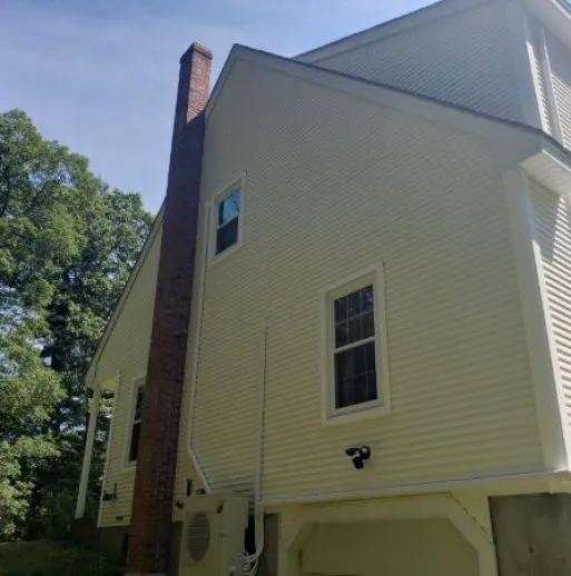 siding of white home after cleaning