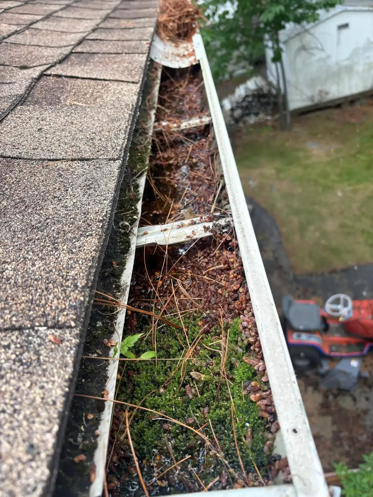 Before: old gutter on the same house