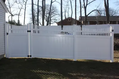 White vinyl fence with double drive gate