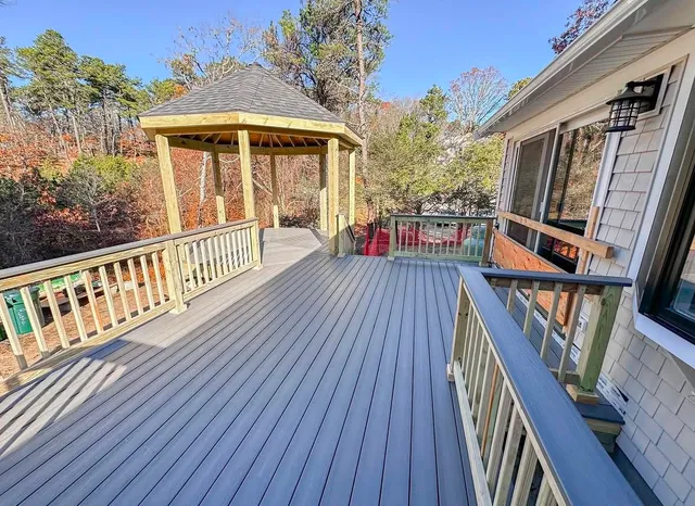 Finished residential wood deck with a covered gazebo