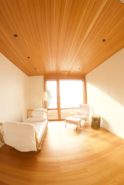 Sun room composed of clear vertical grained Douglas fir and old growth pine flooring. Finishes are 13% sheen at 90 degrees.