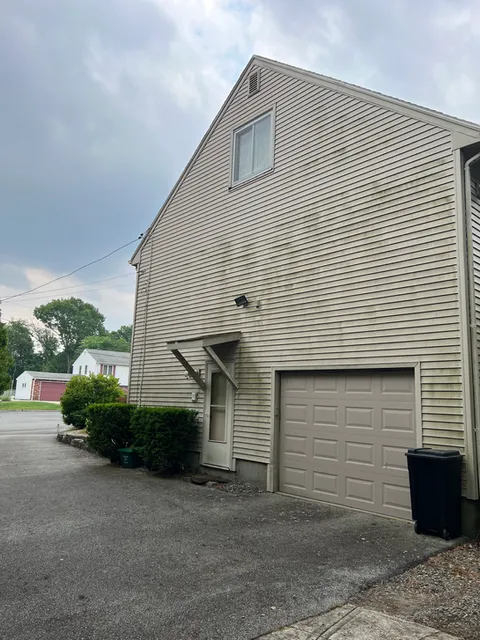 House exterior and driveway before power washing