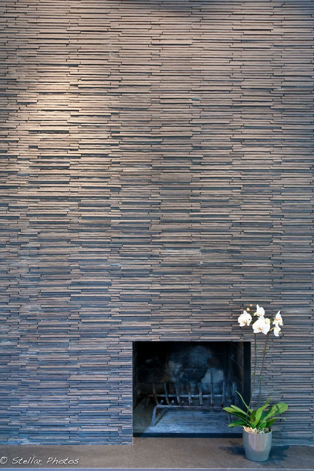 contemporary-carriage-house-modern-fireplace-01.jpg