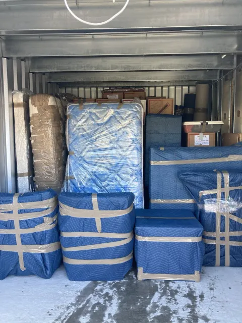 Furniture wrapped in padding for Vacationland Moving Company in Maine