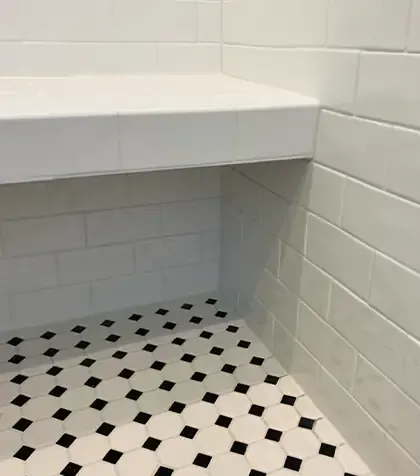Shower floor and wall with grout restoration in Maine