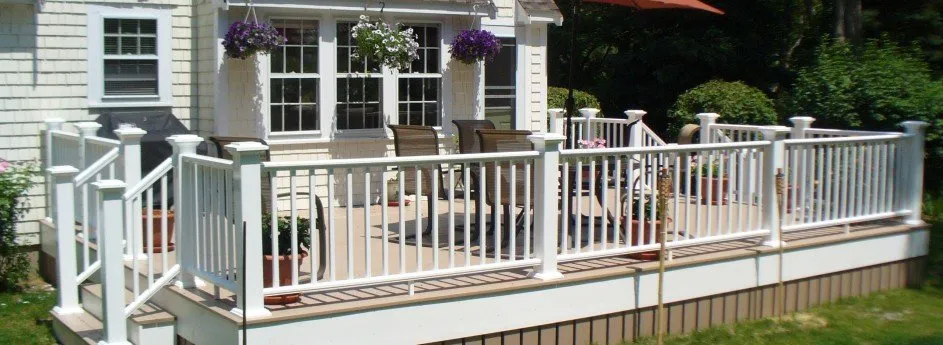 Beatiful outdoor deck in the sunshine with stairs and open railings