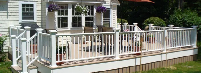 Beatiful outdoor deck in the sunshine with stairs and open railings