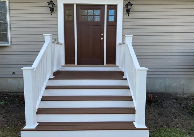 Exterior front steps and finish carpentry by KBK Woodworking