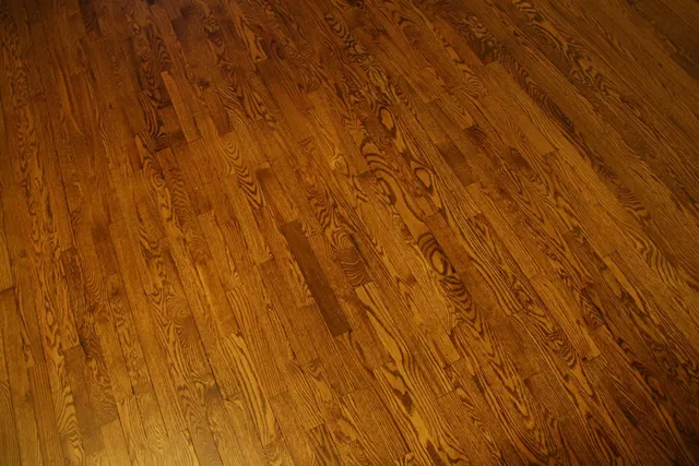 Close view of a freshly sanded and stained oak floor