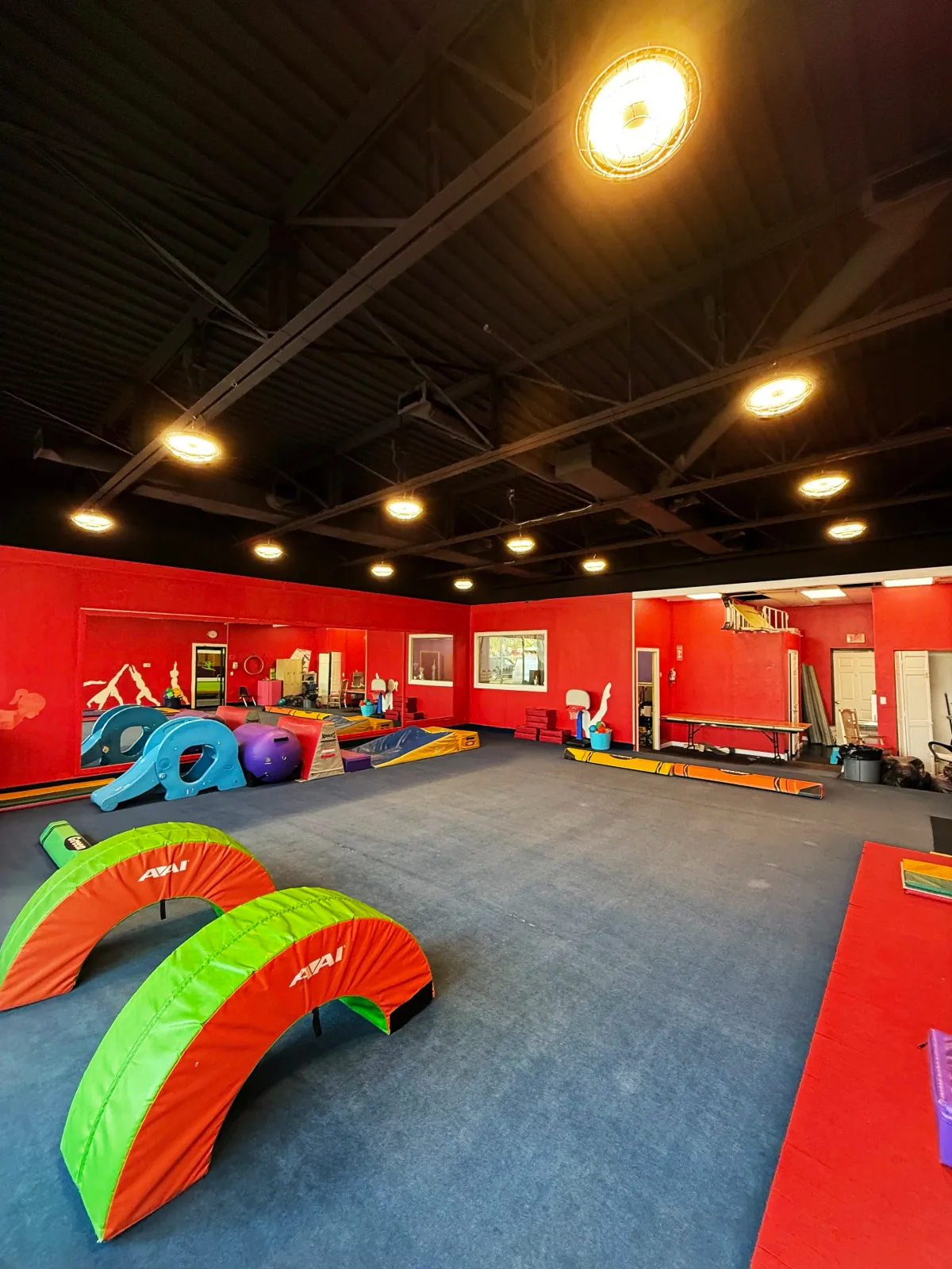 Commercial gym ceiling with LED lighting installation in South Shore Massachusetts