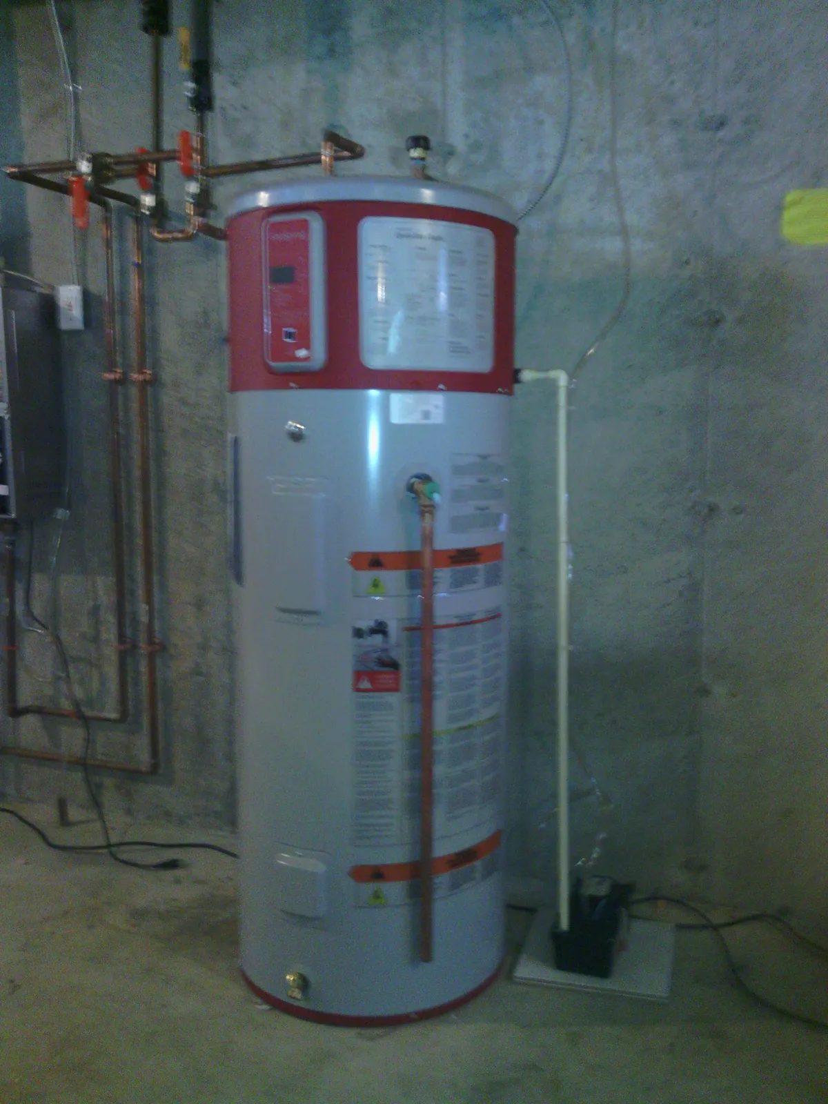 Heat-pump water heater installed and piped in copper