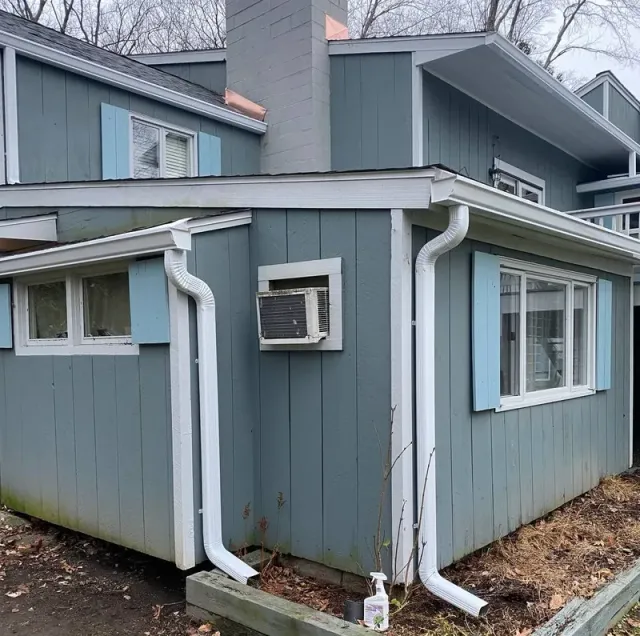 Seamless gutters and downspouts installed on a home in Wilton, CT