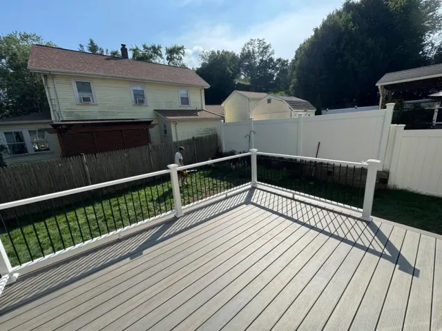 Enhance your outdoor living with our expert deck construction service, offering durable materials and customized designs to create a perfect space for relaxation and entertainment in harmony with your home. for Belfort Builders in Kingston, MA