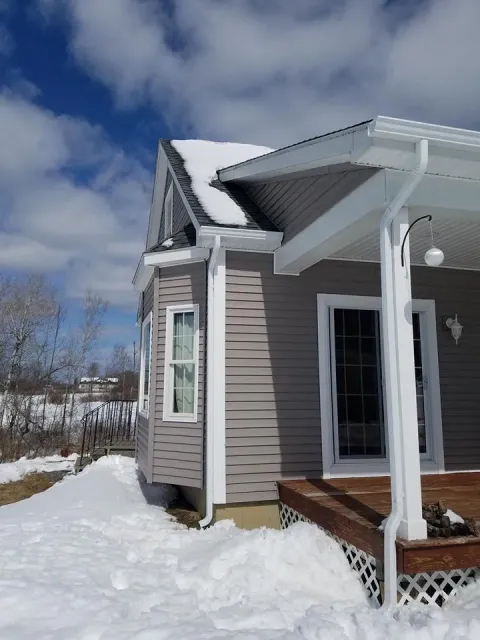 Seamless gutters on new home exterior