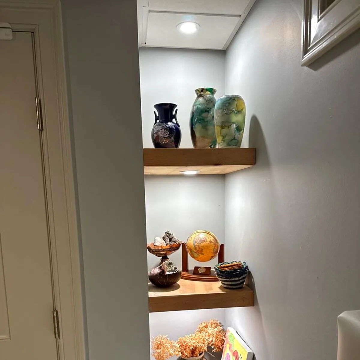 Floating shelves installed in a corner