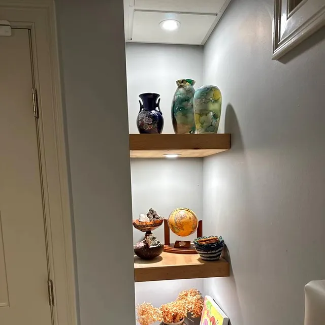 Floating shelves installed in a corner
