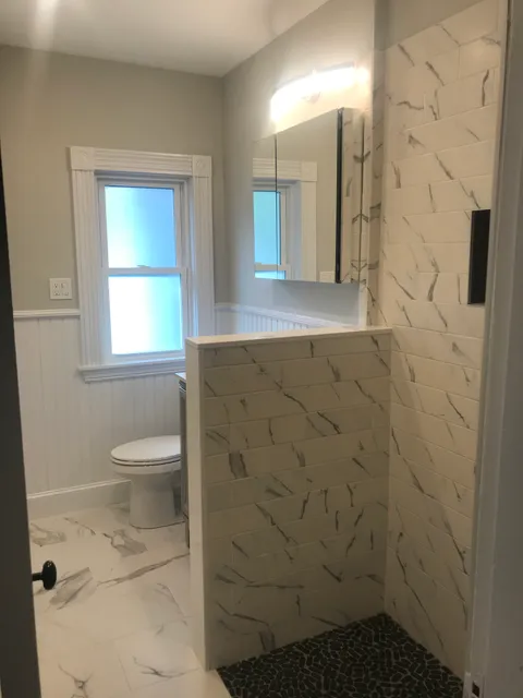 Bathroom remodel with marble tile