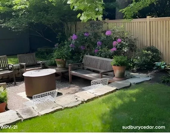 Cedar privacy fence in landscaped backyard.