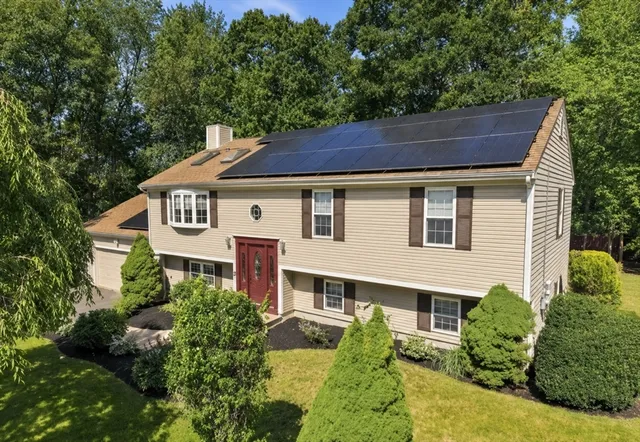 A RARE FIND IN NORTH DARTMOUTH! 25 BUTTERFLY TRAIL OFFERS A SPACIOUS LOWER LEVEL WITH ITS OWN KITCHEN, FULL BATH, BEDROOM, AND LIVING AREA CREATING A COMFORTABLE AND VERSATILE SECOND LIVING SPACE. IDEAL FOR MULTI-GENERATIONAL LIVING, EXTENDED FAMILY, GUESTS OR ADDITIONAL SPACE FOR YOUR OWN ENJOYMENT & CONVENIENCE. Located in desirable Butterfly Acres, this raised ranch is tucked at the end of a quiet cul-del-sac, surrounded by lovely homes and peaceful wooded backdrop. The main level showcases a stunning, recently renovated eat-in kitchen featuring white cabinetry, an apron-front farmhouse sink, sparkling gray & white granite countertops, stainless steel appliances, a vented chimney-style range hood and a spacious center island with built-in microwave. Cathedral ceilings, distinctive lighting, and abundant natural light create a welcoming gathering space. The inviting sun-filled living room showcases a cozy fireplace, a stunning bow window, soaring skylights, elegant designer lighting and freshly painted walls. Down the hall are three bedrooms, including a primary suite with its own full bath, plus an additional full bathroom. Just off the kitchen, French doors open to a heated sunroom wrapped in windows, offering picturesque views of the backyard's charming perennial gardens and peaceful wooded backdrop. The finished lower level offers a second living area with its own private entrance, spacious bedroom with recessed lighting and 2 double closets, beautifully renovated kitchen mirroring the finishes upstairs, dining area, living room with custom built-in shelving, full bath, and its own heated sunroom. A separate laundry area, utility room, and oversized two-car garage complete the lower level. Additional highlights include owned solar panels for significant energy savings (roof & solar panels installed 2019), a private backyard that backs to nothing but tranquil woods. If you’re seeking a beautiful home in one of Dartmouth’s most desirable neighborhoods, 25 Butterfly Trail is a rare opportunity you won’t want to miss. This is an estate sale requiring court approval - closing is anticipated within approximately 60 days after the Purchase and Sale Agreement is signed.