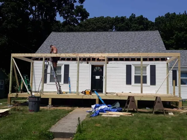 Before — front porch timber frame during deck building in Sutton, MA