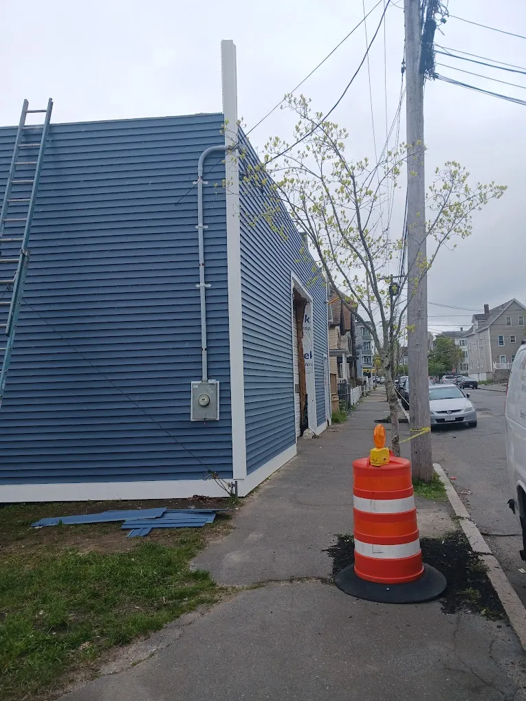 Light blue commercial property painting project in Massachusetts - NG Painting Pro commercial work