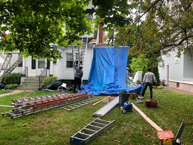 work photo from newroofingandsiding.com
