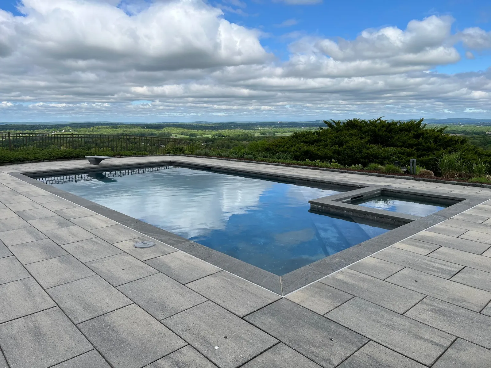 Hilltop pool and attached spa with sweeping valley views — Bloomfield, CT