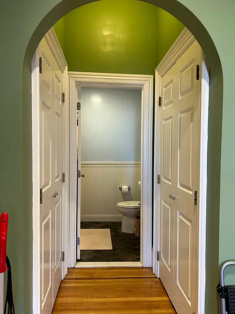 Hallway leading to a bathroom