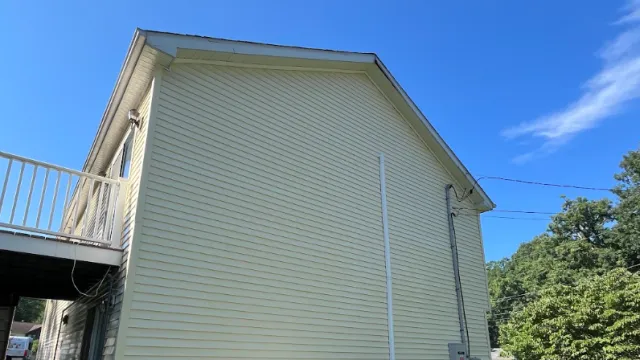 Picture of house siding after soft house washing.png
