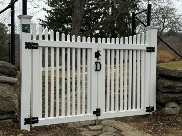 Custom vinyl picket scalloped gates in Ridgefield, CT.