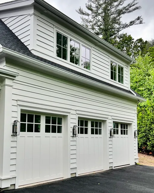 Sometimes you just need to keep it simple and classic&hellip; I love these three 9x9, 3 section Versatex doors. ⁣
On the inside is high lift track and side mount openers. ⁣
⁣
⁣
#designergaragedoors #designerdoor #customgaragedoors #carriagehousedoor