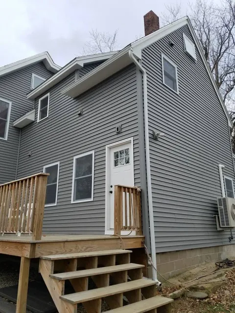 Two-story home with seamless gutters