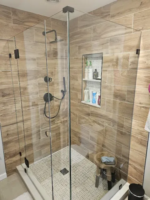 Frameless shower with wood-look tile
