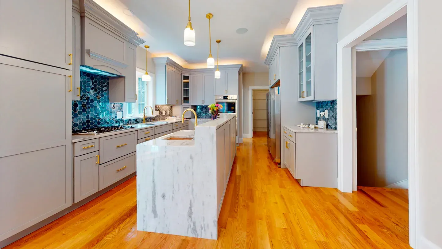 Cabinet crown, casing, and cove lighting detail