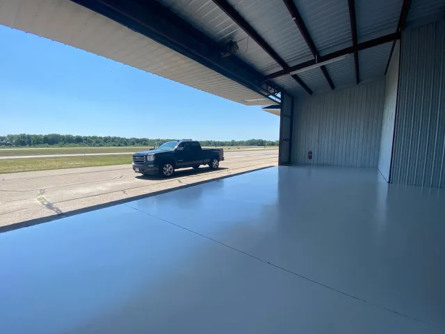 Solid White Epoxy Floor - Aircraft Hangar