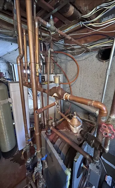 Old boiler before boiler installation near Barrington NH