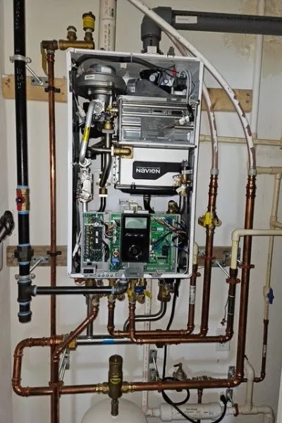 Open tankless water heater with copper piping